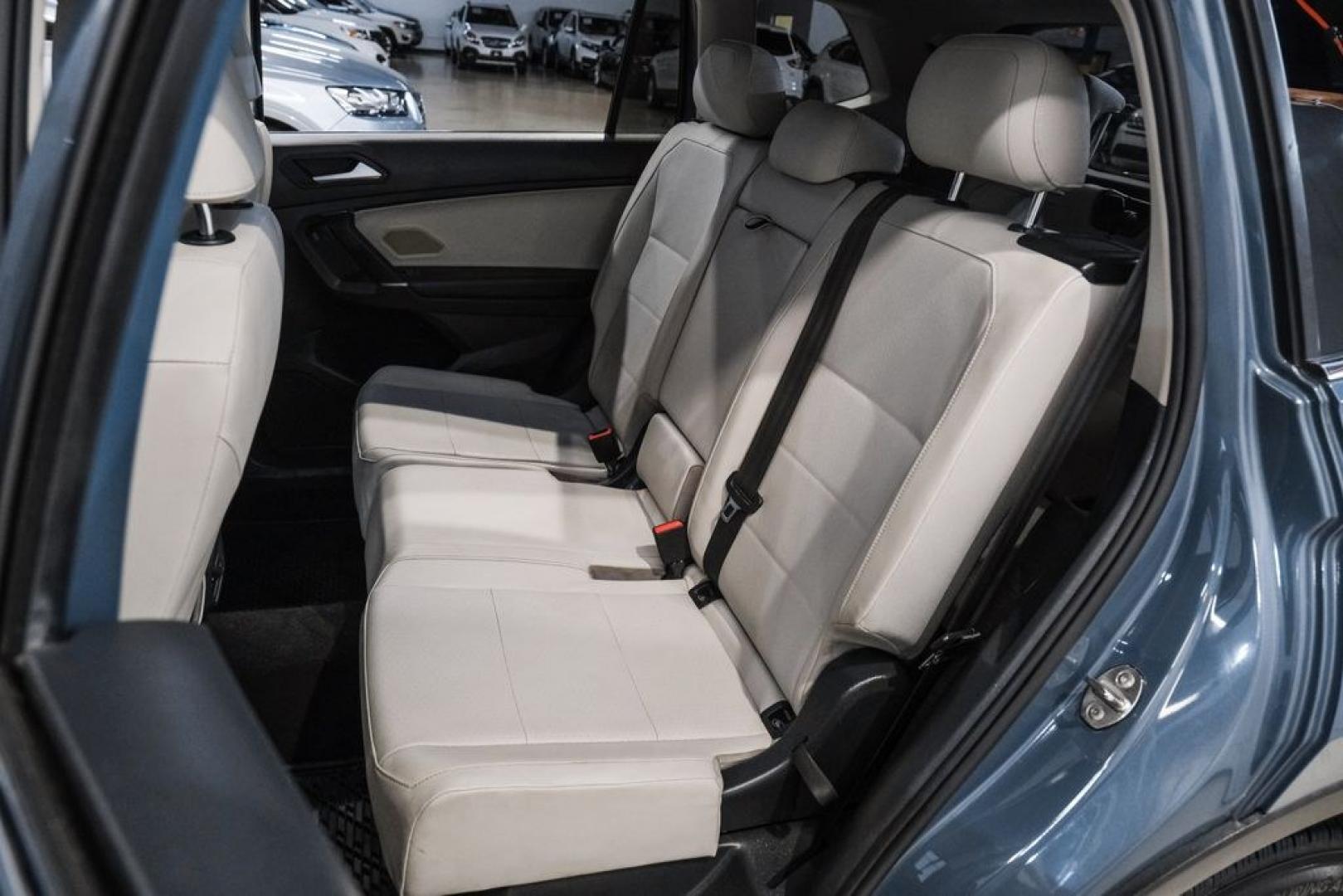 2020 Blue Metallic /Storm Gray Volkswagen Tiguan 2.0T SE (3VV3B7AX0LM) with an 2.0L TSI DOHC engine, Automatic transmission, located at 15300 Midway Rd., Addison, TX, 75001, (972) 702-0011, 32.958321, -96.838074- Photo#37