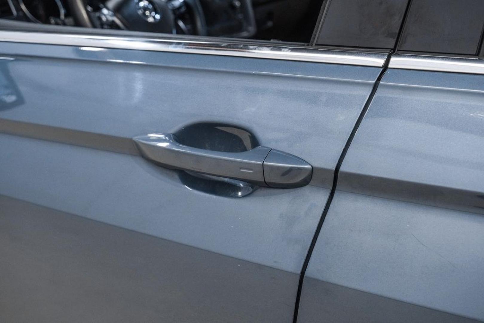 2020 Blue Metallic /Storm Gray Volkswagen Tiguan 2.0T SE (3VV3B7AX0LM) with an 2.0L TSI DOHC engine, Automatic transmission, located at 15300 Midway Rd., Addison, TX, 75001, (972) 702-0011, 32.958321, -96.838074- Photo#38