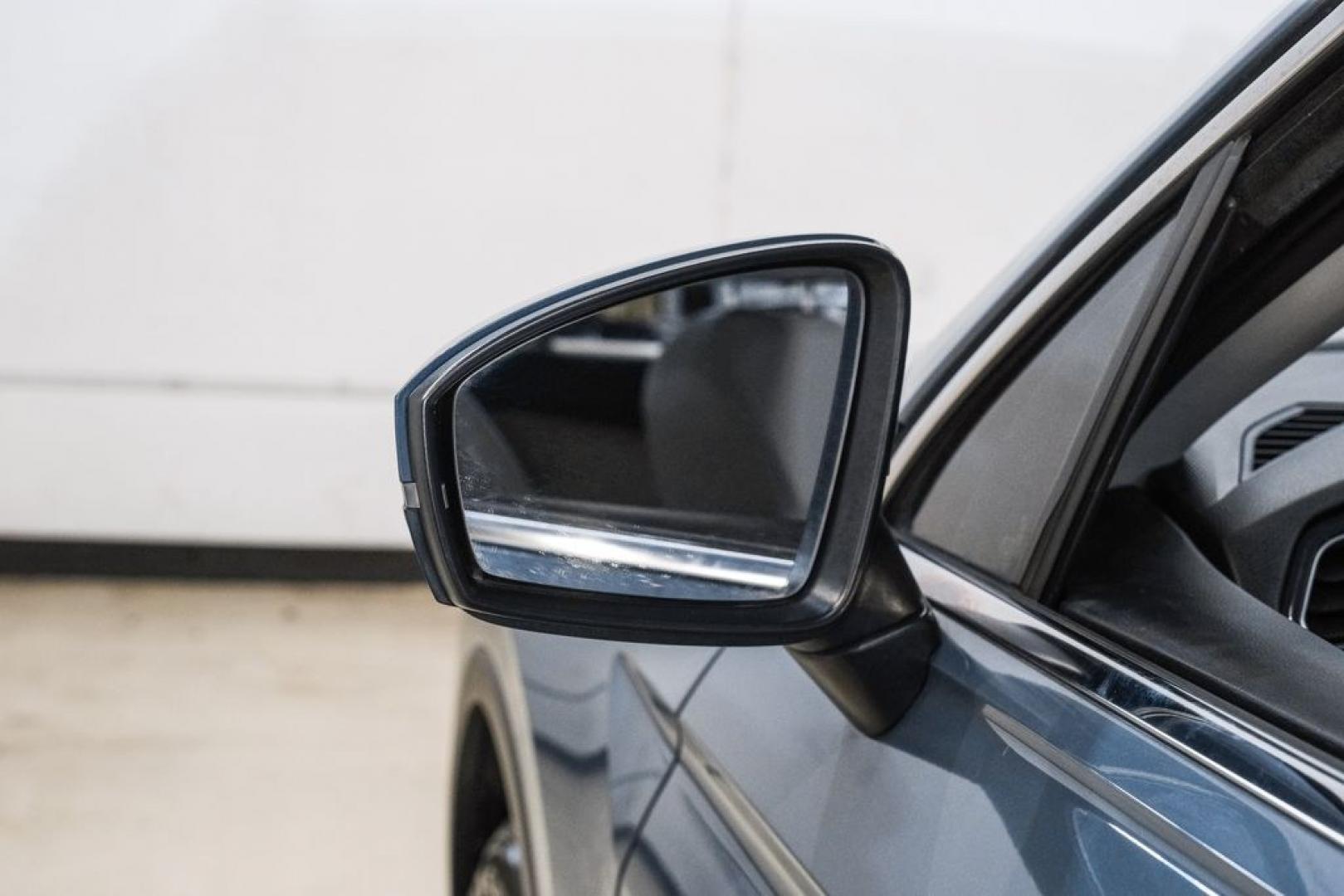 2020 Blue Metallic /Storm Gray Volkswagen Tiguan 2.0T SE (3VV3B7AX0LM) with an 2.0L TSI DOHC engine, Automatic transmission, located at 15300 Midway Rd., Addison, TX, 75001, (972) 702-0011, 32.958321, -96.838074- Photo#39