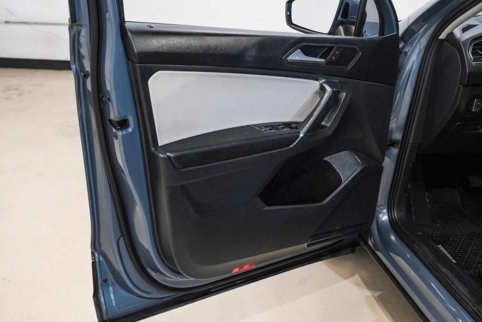 2020 Blue Metallic /Storm Gray Volkswagen Tiguan 2.0T SE (3VV3B7AX0LM) with an 2.0L TSI DOHC engine, Automatic transmission, located at 15300 Midway Rd., Addison, TX, 75001, (972) 702-0011, 32.958321, -96.838074- Photo#40