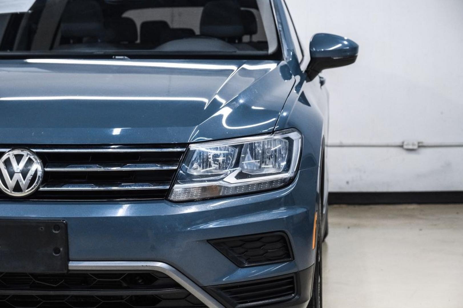 2020 Blue Metallic /Storm Gray Volkswagen Tiguan 2.0T SE (3VV3B7AX0LM) with an 2.0L TSI DOHC engine, Automatic transmission, located at 15300 Midway Rd., Addison, TX, 75001, (972) 702-0011, 32.958321, -96.838074- Photo#45