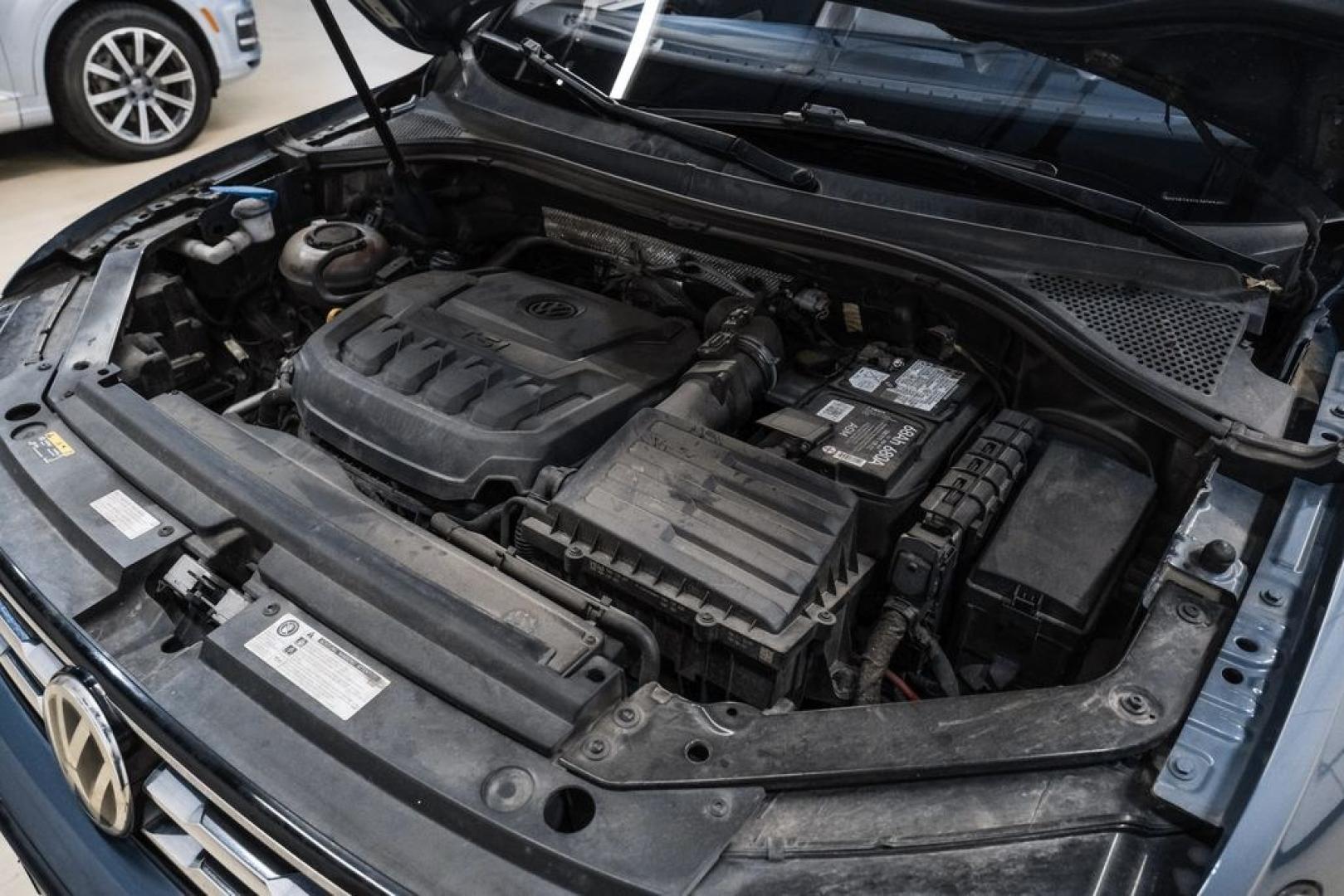 2020 Blue Metallic /Storm Gray Volkswagen Tiguan 2.0T SE (3VV3B7AX0LM) with an 2.0L TSI DOHC engine, Automatic transmission, located at 15300 Midway Rd., Addison, TX, 75001, (972) 702-0011, 32.958321, -96.838074- Photo#47