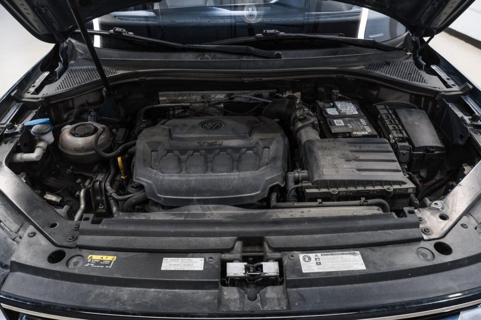 2020 Blue Metallic /Storm Gray Volkswagen Tiguan 2.0T SE (3VV3B7AX0LM) with an 2.0L TSI DOHC engine, Automatic transmission, located at 15300 Midway Rd., Addison, TX, 75001, (972) 702-0011, 32.958321, -96.838074- Photo#48