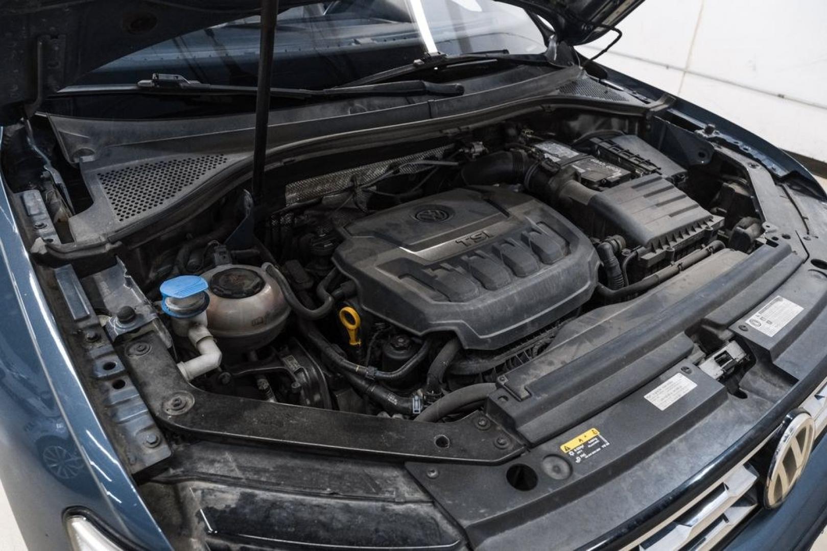 2020 Blue Metallic /Storm Gray Volkswagen Tiguan 2.0T SE (3VV3B7AX0LM) with an 2.0L TSI DOHC engine, Automatic transmission, located at 15300 Midway Rd., Addison, TX, 75001, (972) 702-0011, 32.958321, -96.838074- Photo#49
