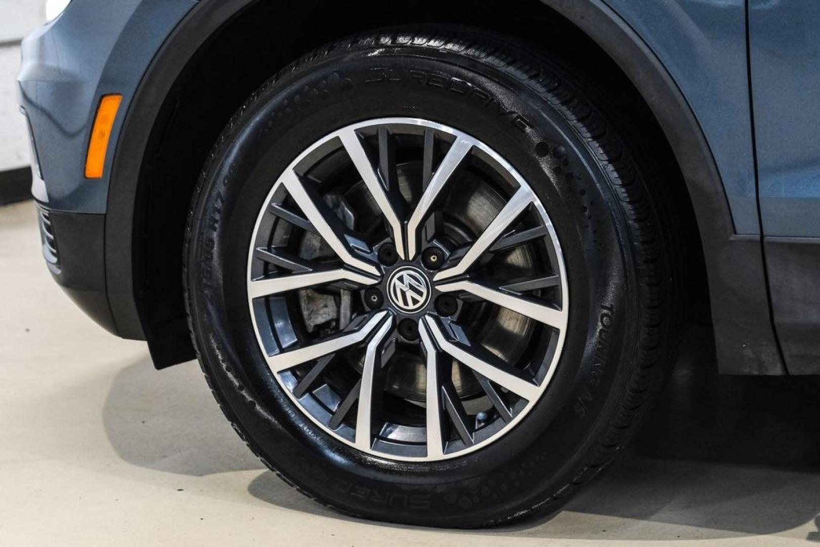 2020 Blue Metallic /Storm Gray Volkswagen Tiguan 2.0T SE (3VV3B7AX0LM) with an 2.0L TSI DOHC engine, Automatic transmission, located at 15300 Midway Rd., Addison, TX, 75001, (972) 702-0011, 32.958321, -96.838074- Photo#52