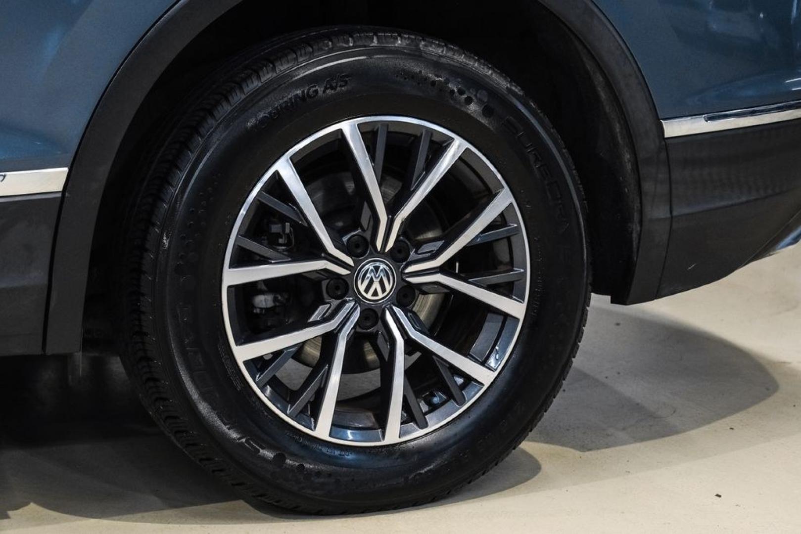 2020 Blue Metallic /Storm Gray Volkswagen Tiguan 2.0T SE (3VV3B7AX0LM) with an 2.0L TSI DOHC engine, Automatic transmission, located at 15300 Midway Rd., Addison, TX, 75001, (972) 702-0011, 32.958321, -96.838074- Photo#53