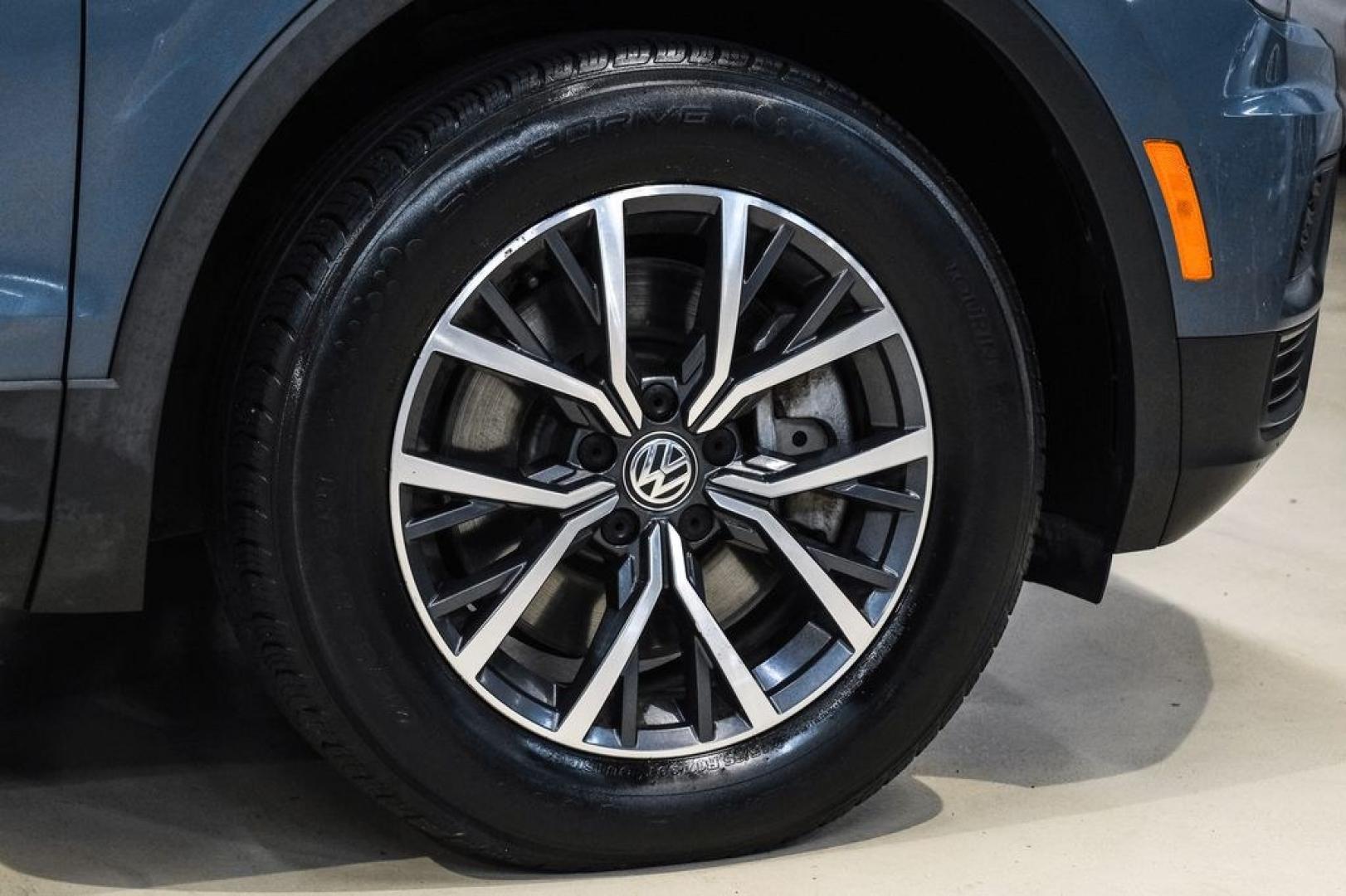 2020 Blue Metallic /Storm Gray Volkswagen Tiguan 2.0T SE (3VV3B7AX0LM) with an 2.0L TSI DOHC engine, Automatic transmission, located at 15300 Midway Rd., Addison, TX, 75001, (972) 702-0011, 32.958321, -96.838074- Photo#55