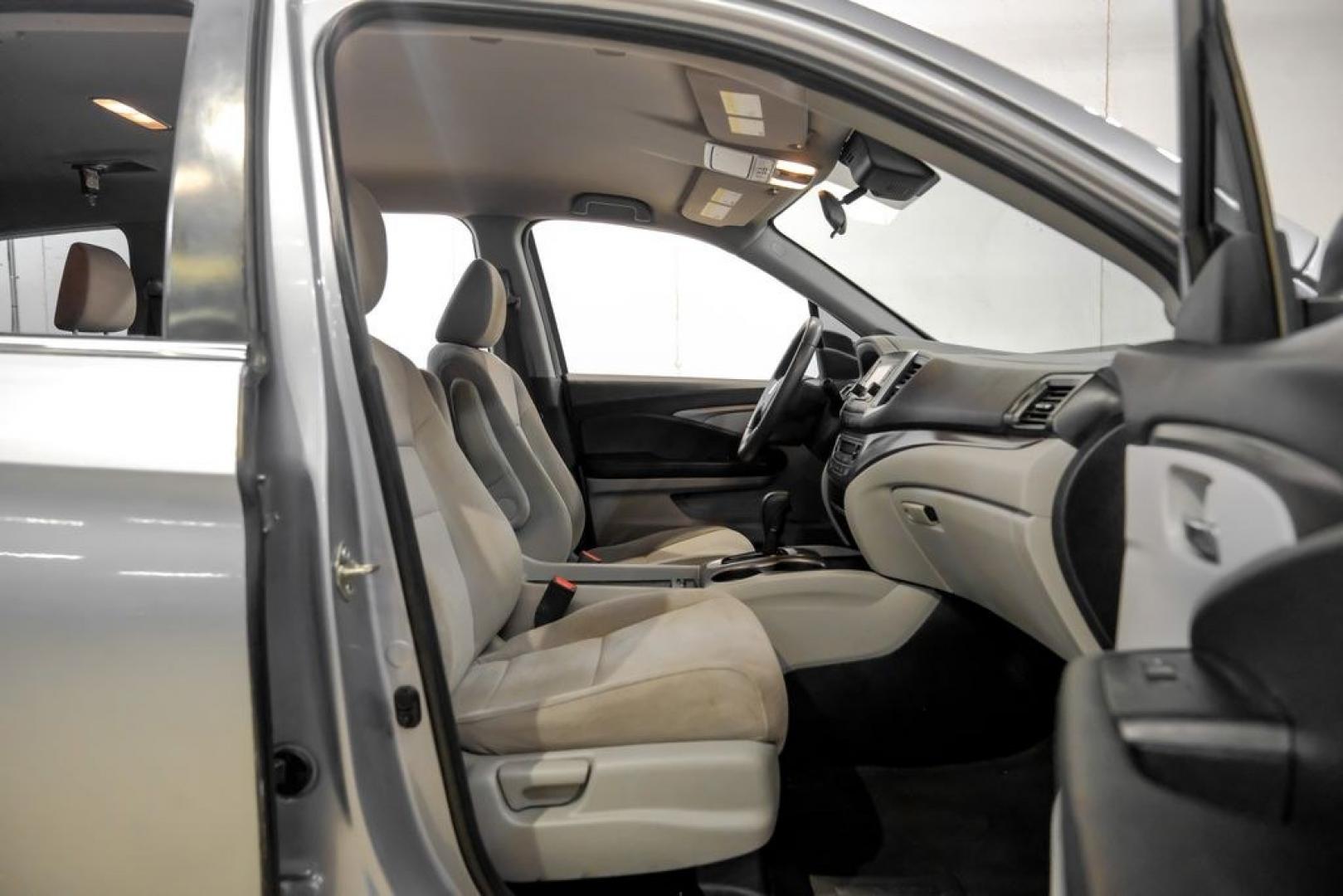 2020 Lunar Silver Metallic /Black Honda Pilot LX (5FNYF5H13LB) with an 3.5L V6 24V SOHC i-VTEC engine, Automatic transmission, located at 15300 Midway Rd., Addison, TX, 75001, (972) 702-0011, 32.958321, -96.838074- Photo#36