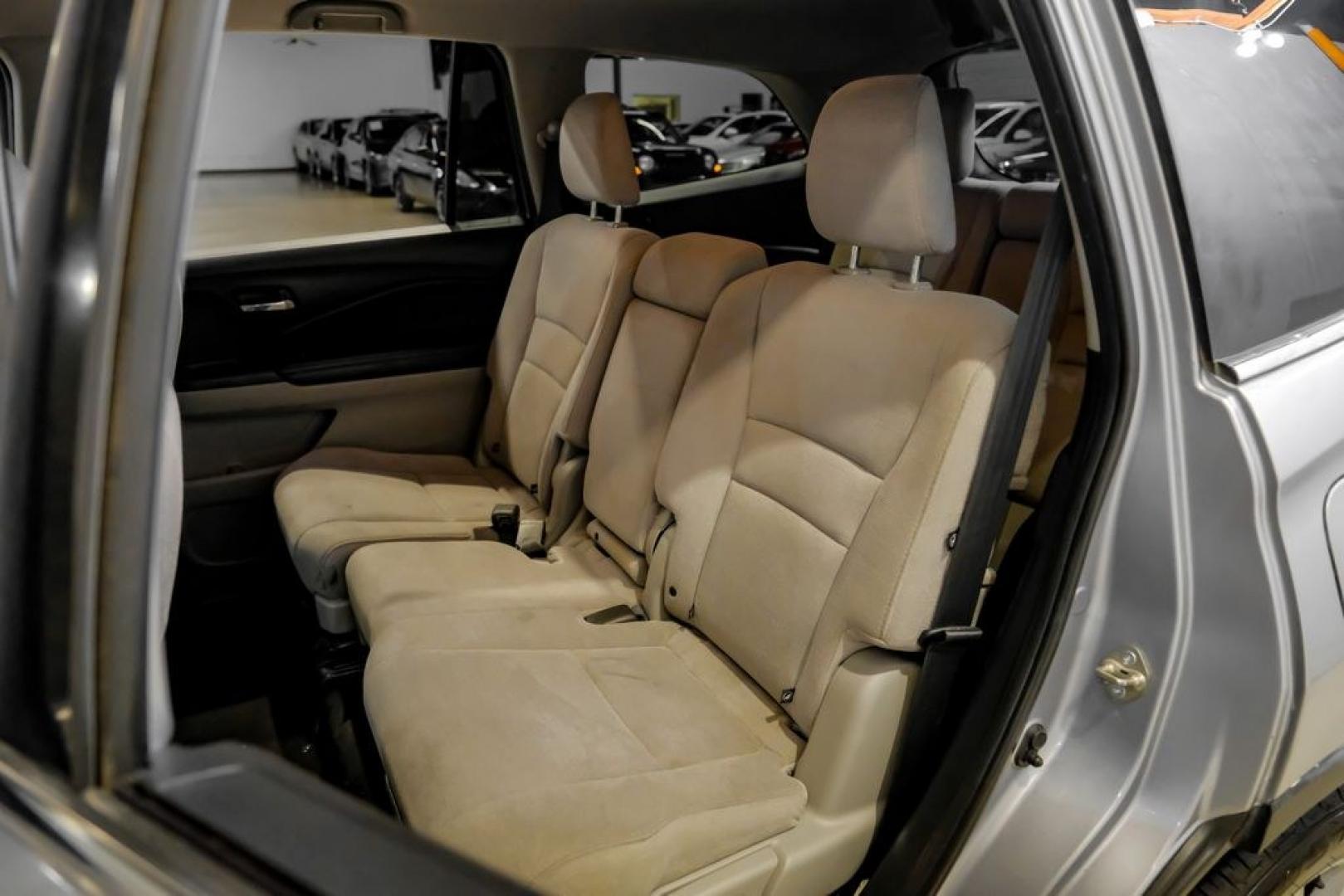 2020 Lunar Silver Metallic /Black Honda Pilot LX (5FNYF5H13LB) with an 3.5L V6 24V SOHC i-VTEC engine, Automatic transmission, located at 15300 Midway Rd., Addison, TX, 75001, (972) 702-0011, 32.958321, -96.838074- Photo#42