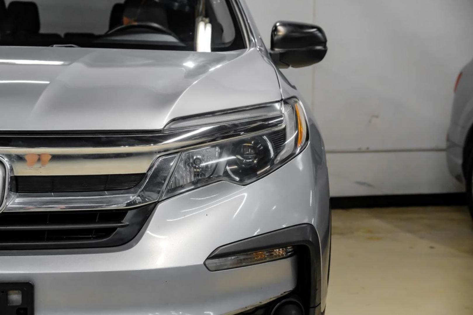 2020 Lunar Silver Metallic /Black Honda Pilot LX (5FNYF5H13LB) with an 3.5L V6 24V SOHC i-VTEC engine, Automatic transmission, located at 15300 Midway Rd., Addison, TX, 75001, (972) 702-0011, 32.958321, -96.838074- Photo#50
