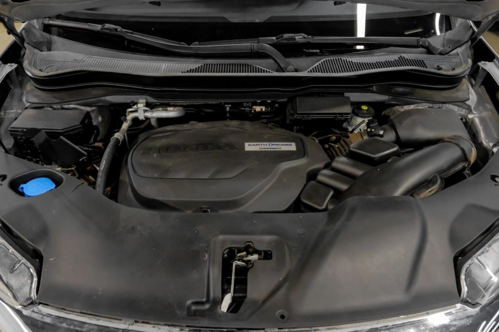 2020 Lunar Silver Metallic /Black Honda Pilot LX (5FNYF5H13LB) with an 3.5L V6 24V SOHC i-VTEC engine, Automatic transmission, located at 15300 Midway Rd., Addison, TX, 75001, (972) 702-0011, 32.958321, -96.838074- Photo#54