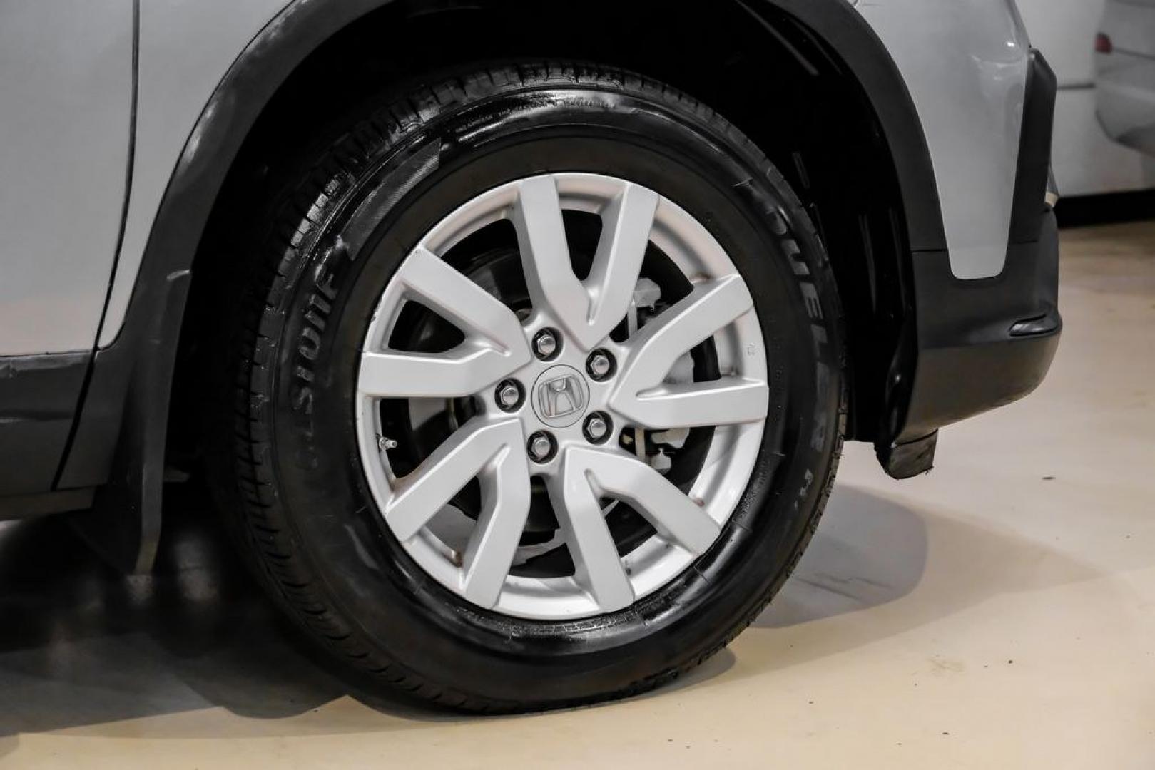 2020 Lunar Silver Metallic /Black Honda Pilot LX (5FNYF5H13LB) with an 3.5L V6 24V SOHC i-VTEC engine, Automatic transmission, located at 15300 Midway Rd., Addison, TX, 75001, (972) 702-0011, 32.958321, -96.838074- Photo#60