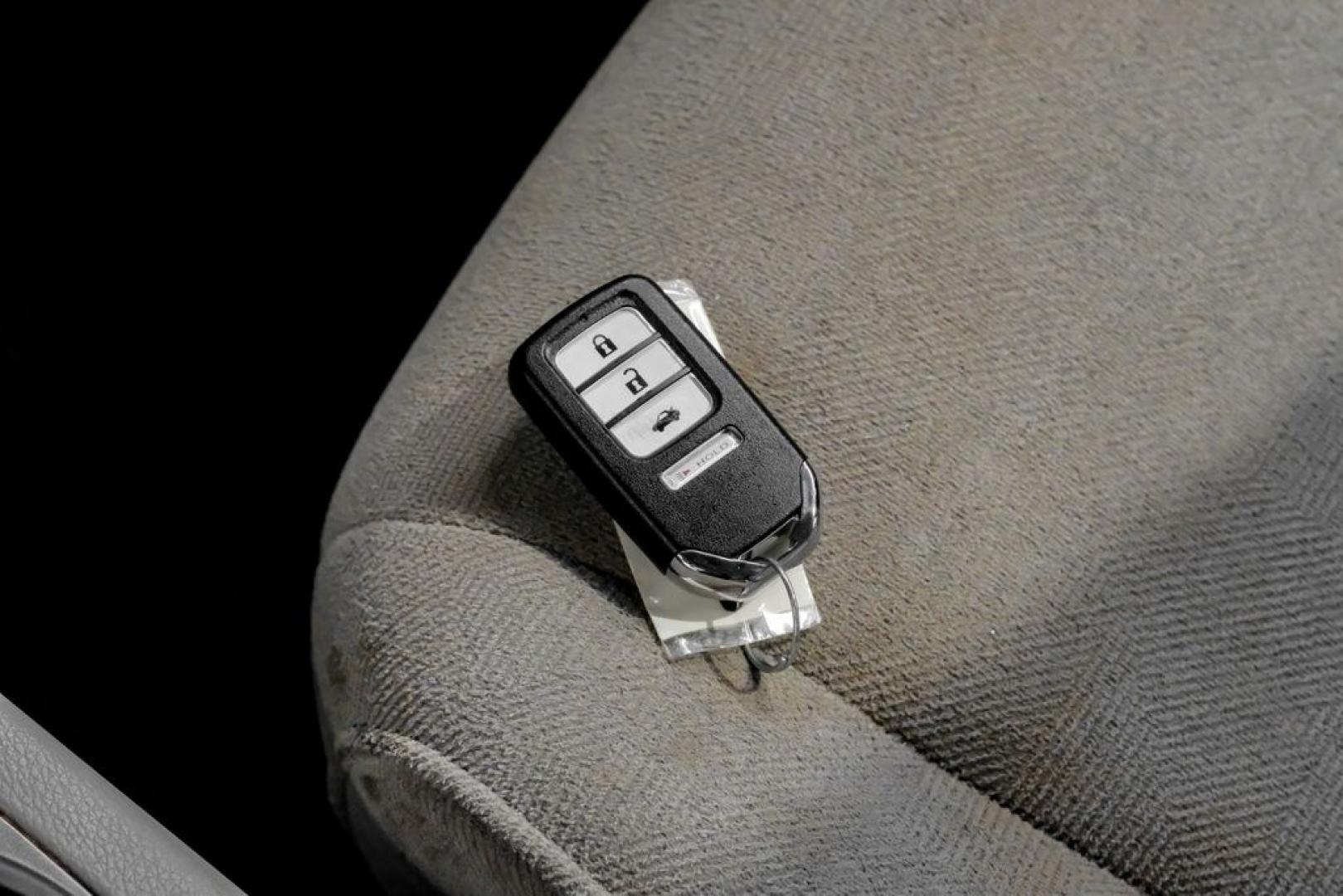 2020 Lunar Silver Metallic /Black Honda Pilot LX (5FNYF5H13LB) with an 3.5L V6 24V SOHC i-VTEC engine, Automatic transmission, located at 15300 Midway Rd., Addison, TX, 75001, (972) 702-0011, 32.958321, -96.838074- Photo#63