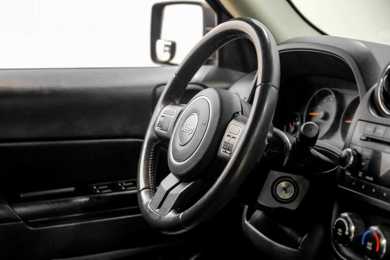 2017 Black Clearcoat /Gray Jeep Patriot Sport (1C4NJPBAXHD) with an 2.0L I4 DOHC 16V Dual VVT engine, CVT transmission, located at 15300 Midway Rd., Addison, TX, 75001, (972) 702-0011, 32.958321, -96.838074- Photo#19