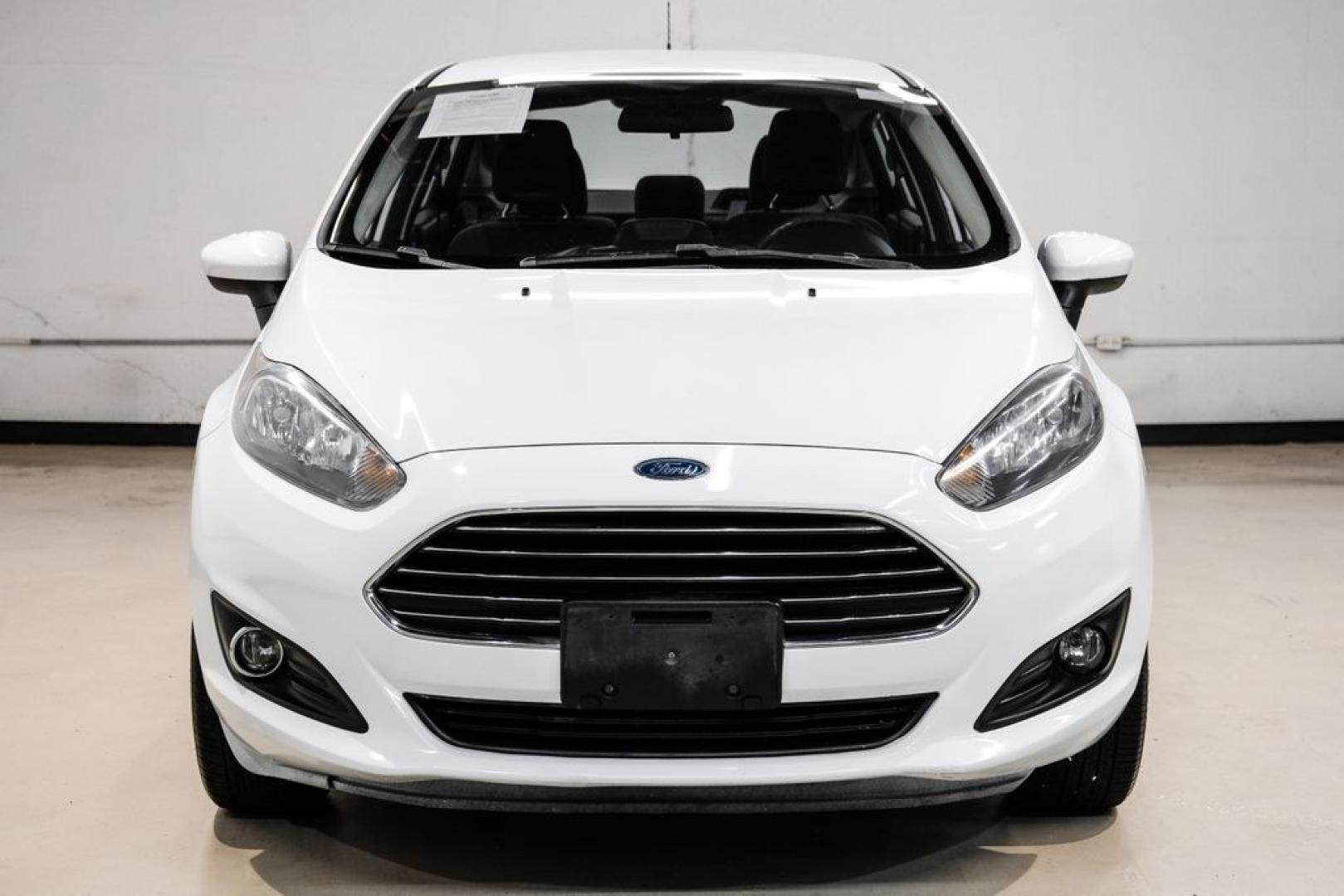 2019 Oxford White /Black Ford Fiesta SE (3FADP4BJ6KM) with an 1.6L I4 Ti-VCT engine, Automatic transmission, located at 15300 Midway Rd., Addison, TX, 75001, (972) 702-0011, 32.958321, -96.838074- Photo#4