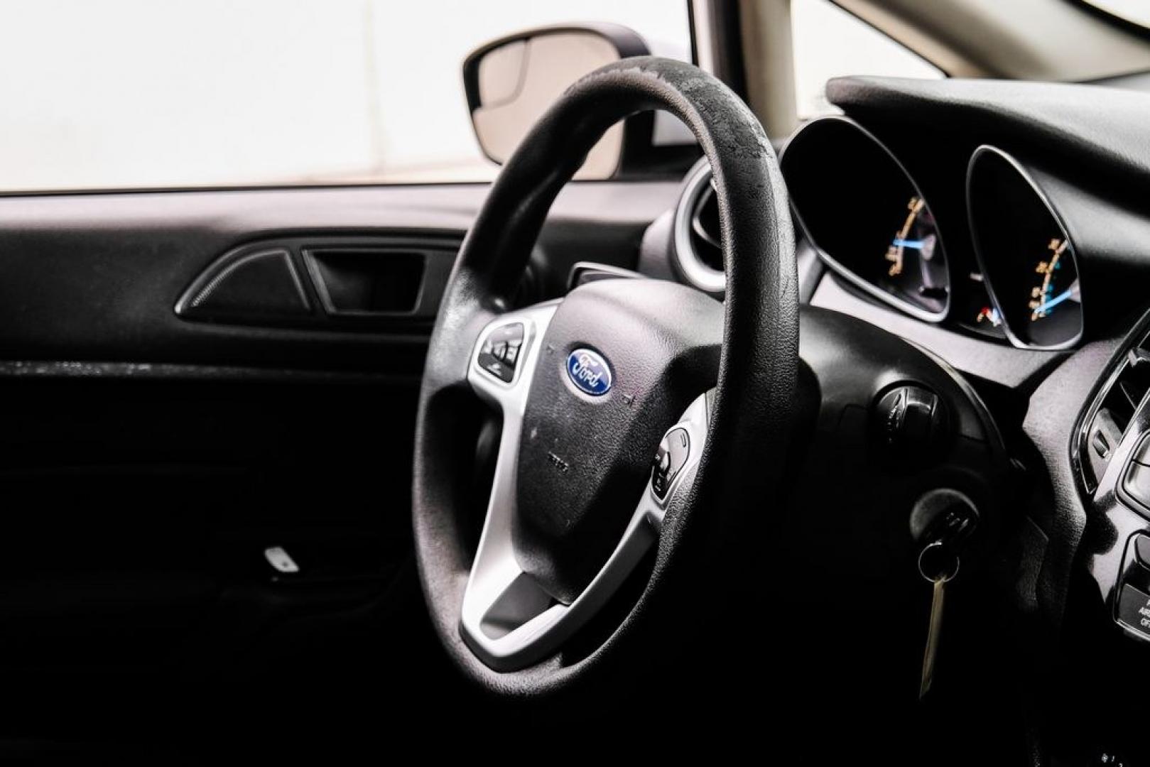 2019 Oxford White /Black Ford Fiesta SE (3FADP4BJ6KM) with an 1.6L I4 Ti-VCT engine, Automatic transmission, located at 15300 Midway Rd., Addison, TX, 75001, (972) 702-0011, 32.958321, -96.838074- Photo#15