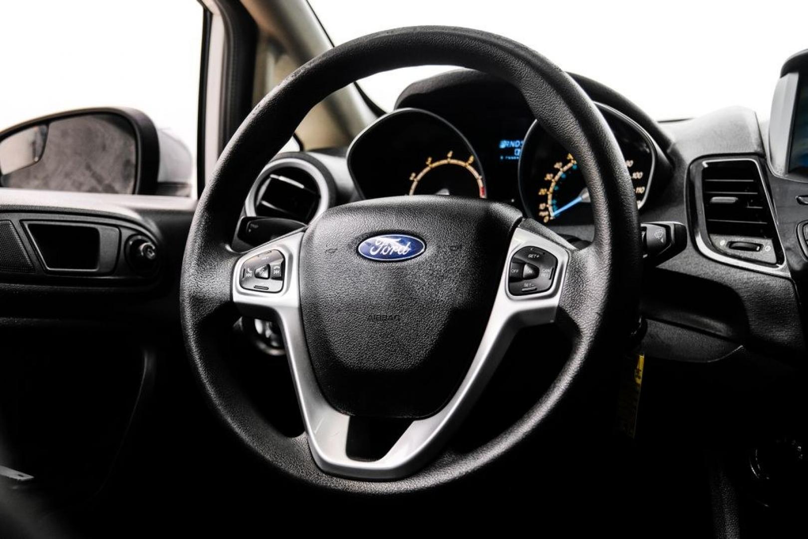 2019 Oxford White /Black Ford Fiesta SE (3FADP4BJ6KM) with an 1.6L I4 Ti-VCT engine, Automatic transmission, located at 15300 Midway Rd., Addison, TX, 75001, (972) 702-0011, 32.958321, -96.838074- Photo#17