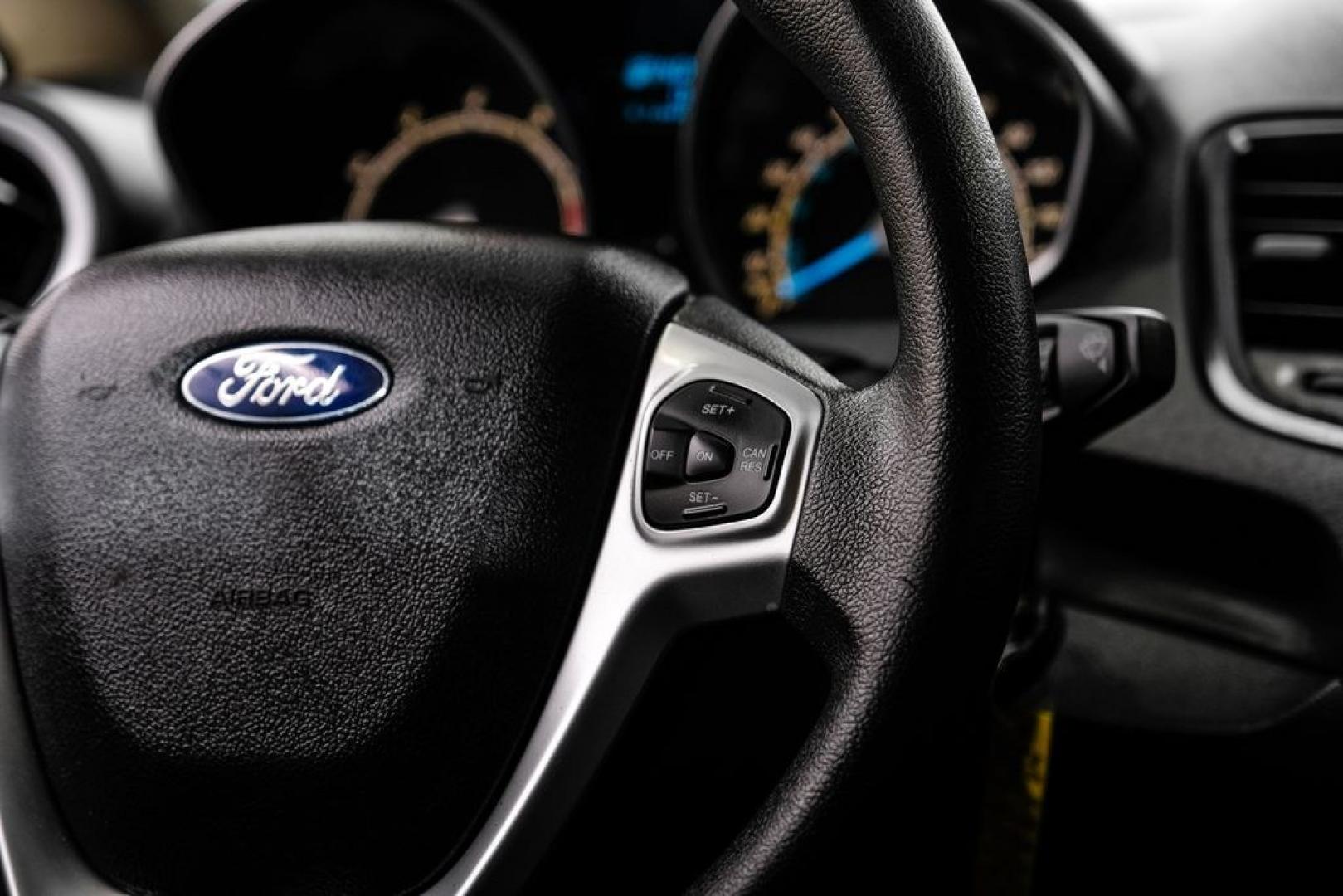 2019 Oxford White /Black Ford Fiesta SE (3FADP4BJ6KM) with an 1.6L I4 Ti-VCT engine, Automatic transmission, located at 15300 Midway Rd., Addison, TX, 75001, (972) 702-0011, 32.958321, -96.838074- Photo#19