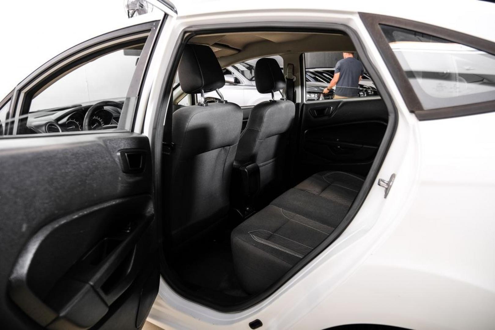2019 Oxford White /Black Ford Fiesta SE (3FADP4BJ6KM) with an 1.6L I4 Ti-VCT engine, Automatic transmission, located at 15300 Midway Rd., Addison, TX, 75001, (972) 702-0011, 32.958321, -96.838074- Photo#40