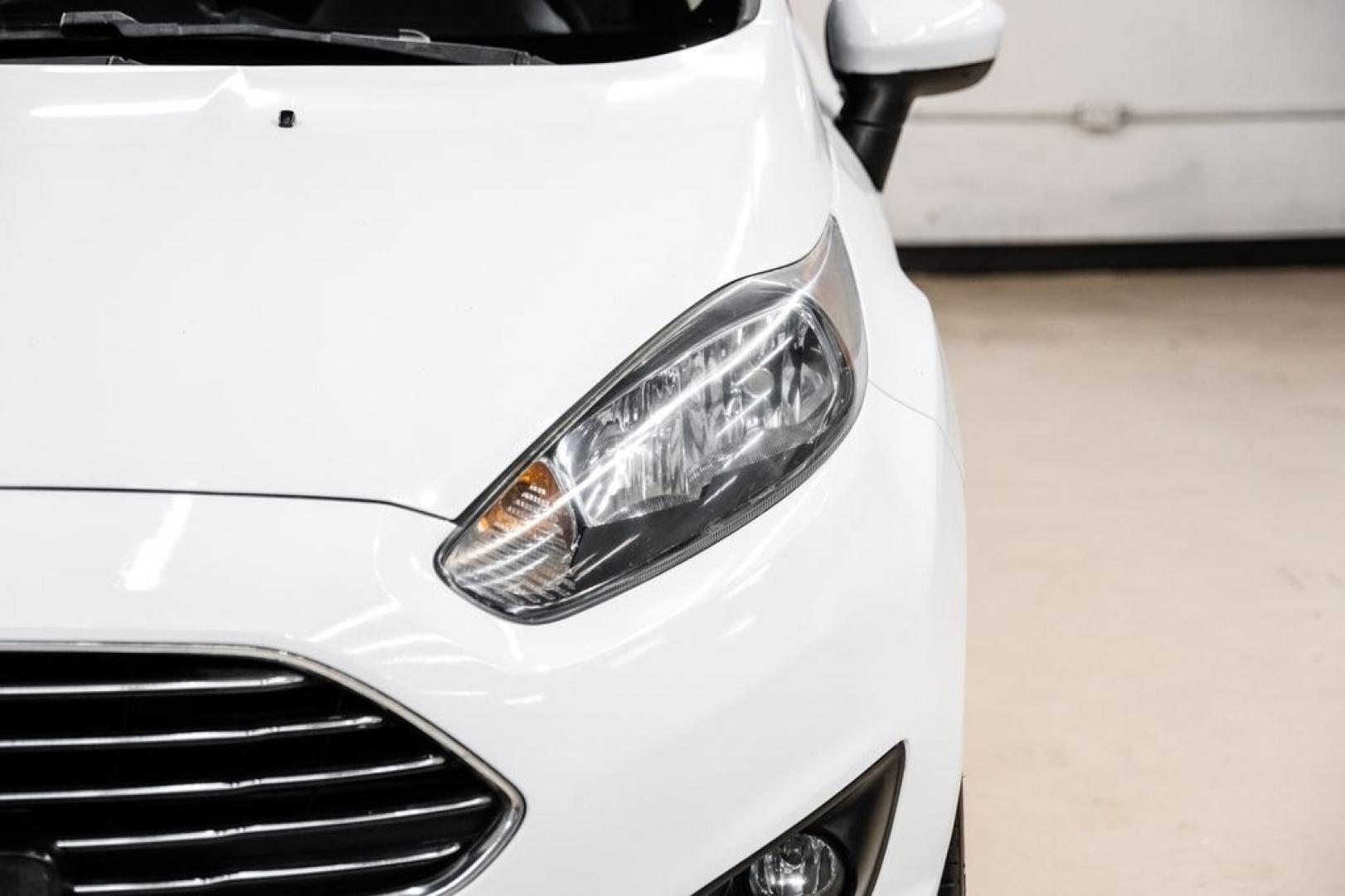 2019 Oxford White /Black Ford Fiesta SE (3FADP4BJ6KM) with an 1.6L I4 Ti-VCT engine, Automatic transmission, located at 15300 Midway Rd., Addison, TX, 75001, (972) 702-0011, 32.958321, -96.838074- Photo#50