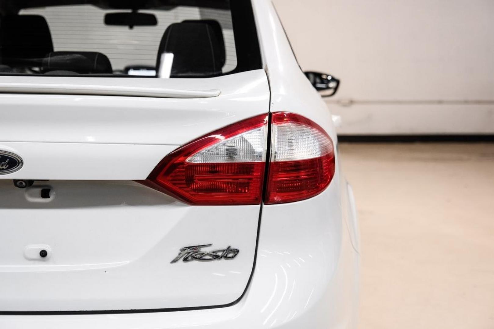 2019 Oxford White /Black Ford Fiesta SE (3FADP4BJ6KM) with an 1.6L I4 Ti-VCT engine, Automatic transmission, located at 15300 Midway Rd., Addison, TX, 75001, (972) 702-0011, 32.958321, -96.838074- Photo#51