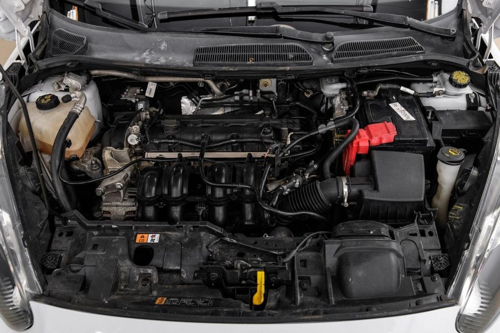 2019 Oxford White /Black Ford Fiesta SE (3FADP4BJ6KM) with an 1.6L I4 Ti-VCT engine, Automatic transmission, located at 15300 Midway Rd., Addison, TX, 75001, (972) 702-0011, 32.958321, -96.838074- Photo#53