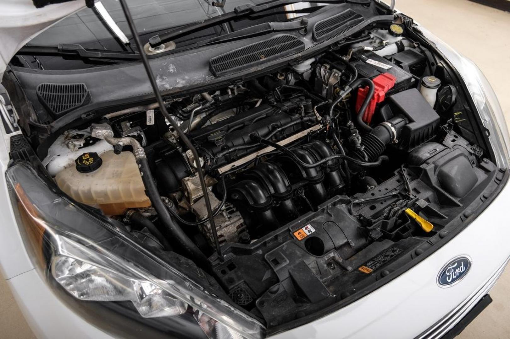 2019 Oxford White /Black Ford Fiesta SE (3FADP4BJ6KM) with an 1.6L I4 Ti-VCT engine, Automatic transmission, located at 15300 Midway Rd., Addison, TX, 75001, (972) 702-0011, 32.958321, -96.838074- Photo#54