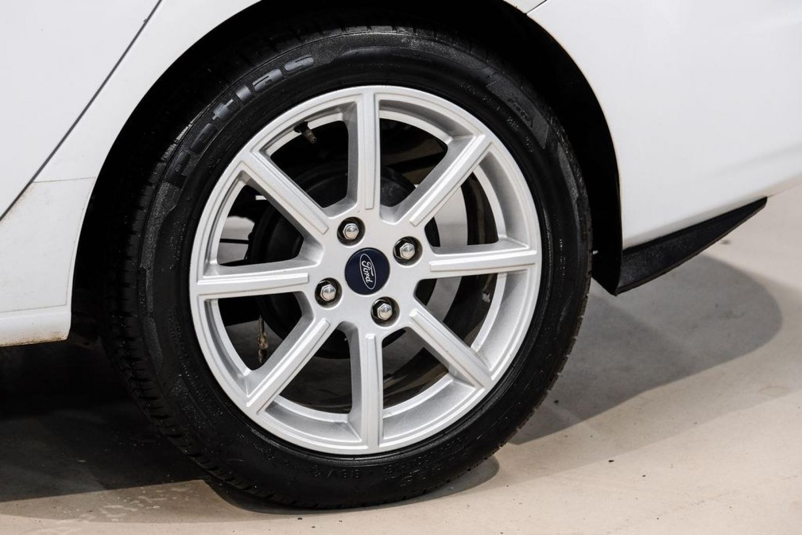 2019 Oxford White /Black Ford Fiesta SE (3FADP4BJ6KM) with an 1.6L I4 Ti-VCT engine, Automatic transmission, located at 15300 Midway Rd., Addison, TX, 75001, (972) 702-0011, 32.958321, -96.838074- Photo#58