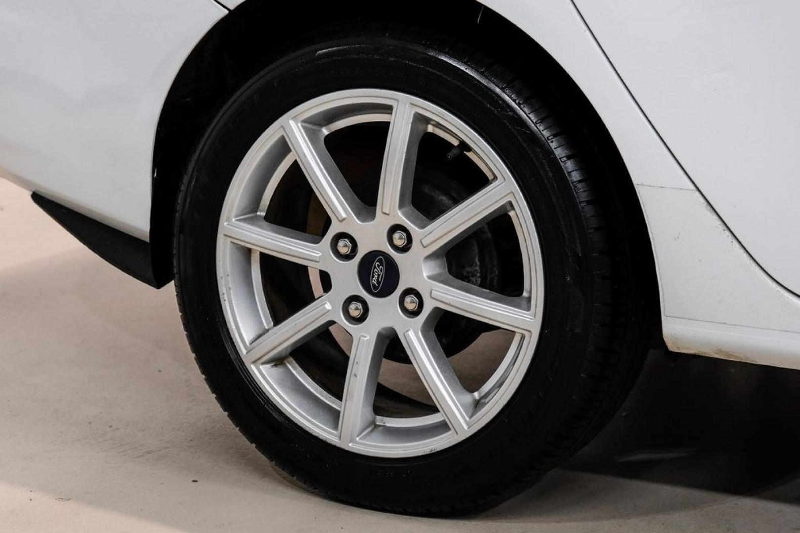 2019 Oxford White /Black Ford Fiesta SE (3FADP4BJ6KM) with an 1.6L I4 Ti-VCT engine, Automatic transmission, located at 15300 Midway Rd., Addison, TX, 75001, (972) 702-0011, 32.958321, -96.838074- Photo#59