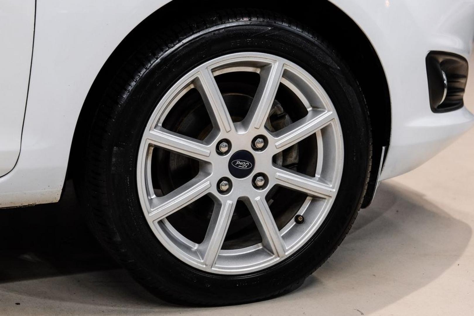2019 Oxford White /Black Ford Fiesta SE (3FADP4BJ6KM) with an 1.6L I4 Ti-VCT engine, Automatic transmission, located at 15300 Midway Rd., Addison, TX, 75001, (972) 702-0011, 32.958321, -96.838074- Photo#60