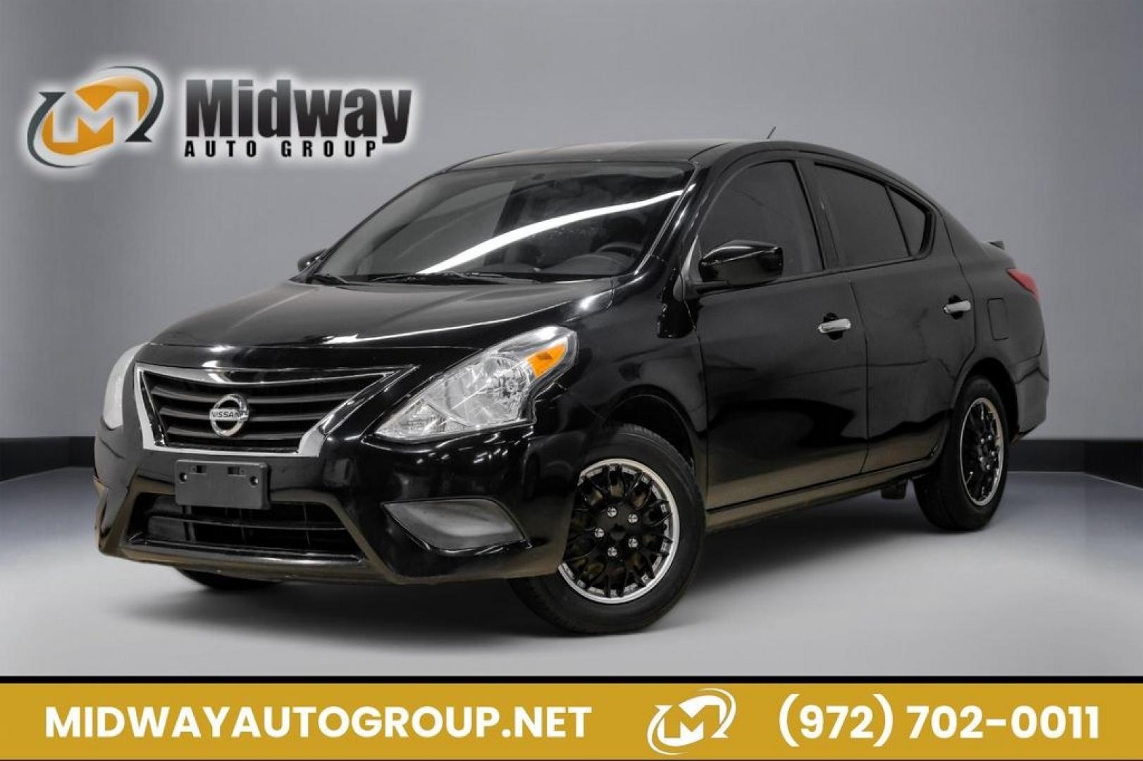 2019 Super Black /Charcoal Nissan Versa 1.6 SV (3N1CN7AP0KL) with an 1.6L 4-Cylinder DOHC 16V engine, CVT transmission, located at 15300 Midway Rd., Addison, TX, 75001, (972) 702-0011, 32.958321, -96.838074- Photo#0