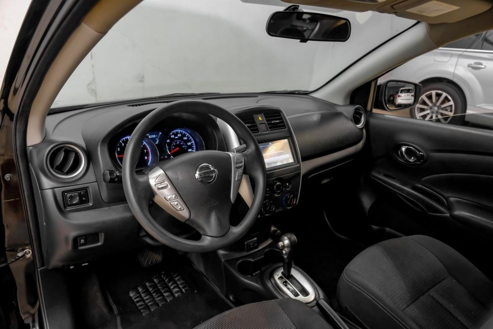 2019 Super Black /Charcoal Nissan Versa 1.6 SV (3N1CN7AP0KL) with an 1.6L 4-Cylinder DOHC 16V engine, CVT transmission, located at 15300 Midway Rd., Addison, TX, 75001, (972) 702-0011, 32.958321, -96.838074- Photo#2