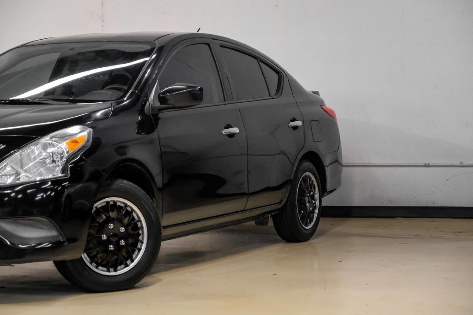 2019 Super Black /Charcoal Nissan Versa 1.6 SV (3N1CN7AP0KL) with an 1.6L 4-Cylinder DOHC 16V engine, CVT transmission, located at 15300 Midway Rd., Addison, TX, 75001, (972) 702-0011, 32.958321, -96.838074- Photo#5