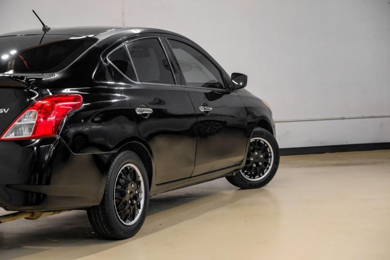 2019 Super Black /Charcoal Nissan Versa 1.6 SV (3N1CN7AP0KL) with an 1.6L 4-Cylinder DOHC 16V engine, CVT transmission, located at 15300 Midway Rd., Addison, TX, 75001, (972) 702-0011, 32.958321, -96.838074- Photo#11