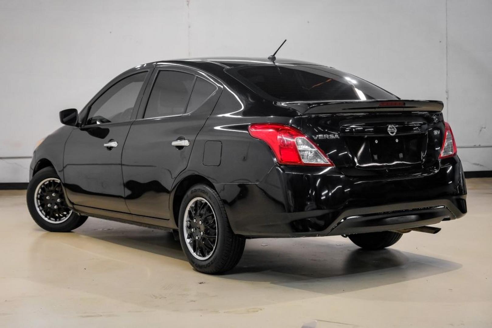 2019 Super Black /Charcoal Nissan Versa 1.6 SV (3N1CN7AP0KL) with an 1.6L 4-Cylinder DOHC 16V engine, CVT transmission, located at 15300 Midway Rd., Addison, TX, 75001, (972) 702-0011, 32.958321, -96.838074- Photo#13