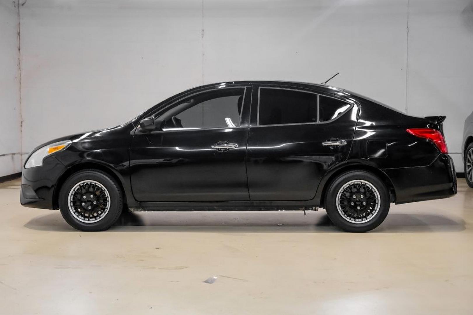 2019 Super Black /Charcoal Nissan Versa 1.6 SV (3N1CN7AP0KL) with an 1.6L 4-Cylinder DOHC 16V engine, CVT transmission, located at 15300 Midway Rd., Addison, TX, 75001, (972) 702-0011, 32.958321, -96.838074- Photo#14