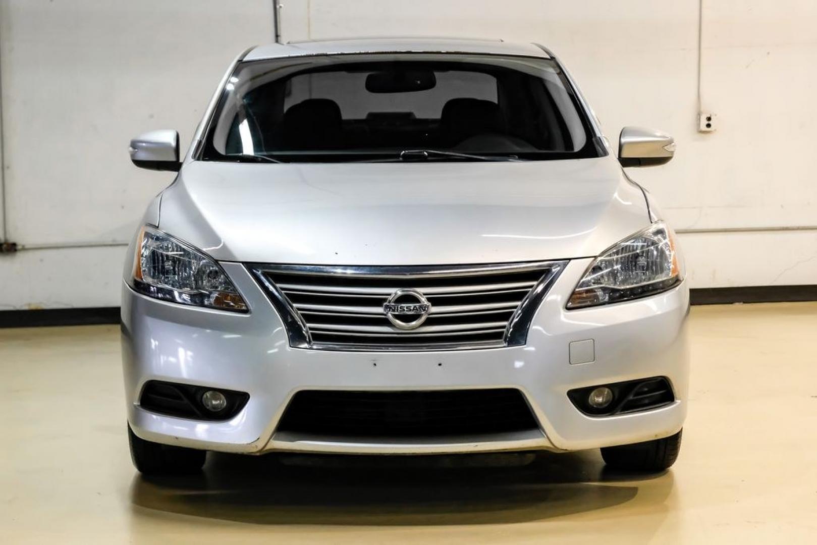2015 Brilliant Silver /Charcoal Nissan Sentra SL (3N1AB7AP2FY) with an 1.8L 4-Cylinder DOHC 16V engine, CVT transmission, located at 15300 Midway Rd., Addison, TX, 75001, (972) 702-0011, 32.958321, -96.838074- Photo#4