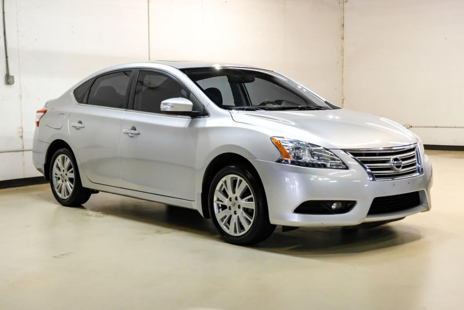 2015 Brilliant Silver /Charcoal Nissan Sentra SL (3N1AB7AP2FY) with an 1.8L 4-Cylinder DOHC 16V engine, CVT transmission, located at 15300 Midway Rd., Addison, TX, 75001, (972) 702-0011, 32.958321, -96.838074- Photo#5