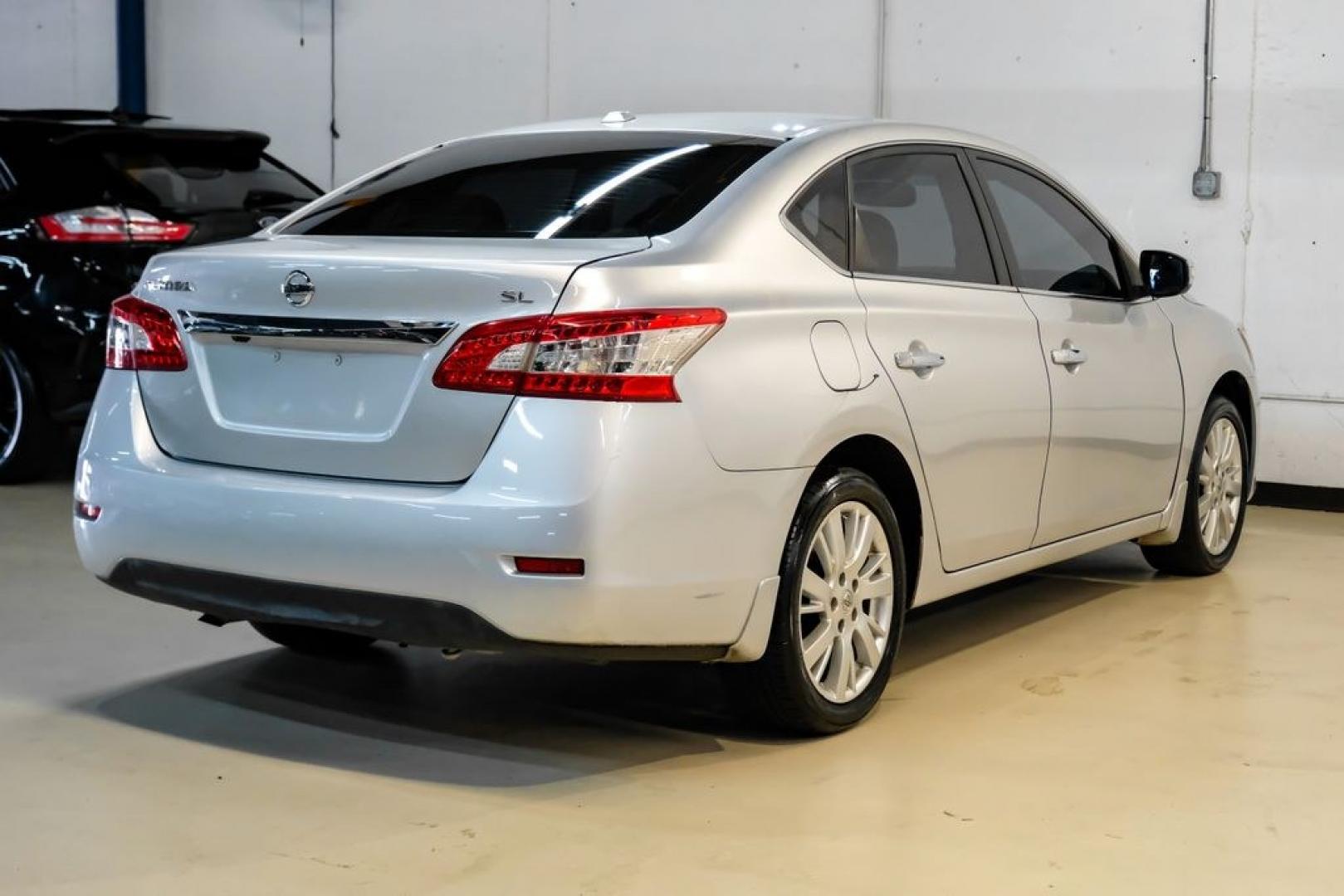 2015 Brilliant Silver /Charcoal Nissan Sentra SL (3N1AB7AP2FY) with an 1.8L 4-Cylinder DOHC 16V engine, CVT transmission, located at 15300 Midway Rd., Addison, TX, 75001, (972) 702-0011, 32.958321, -96.838074- Photo#7