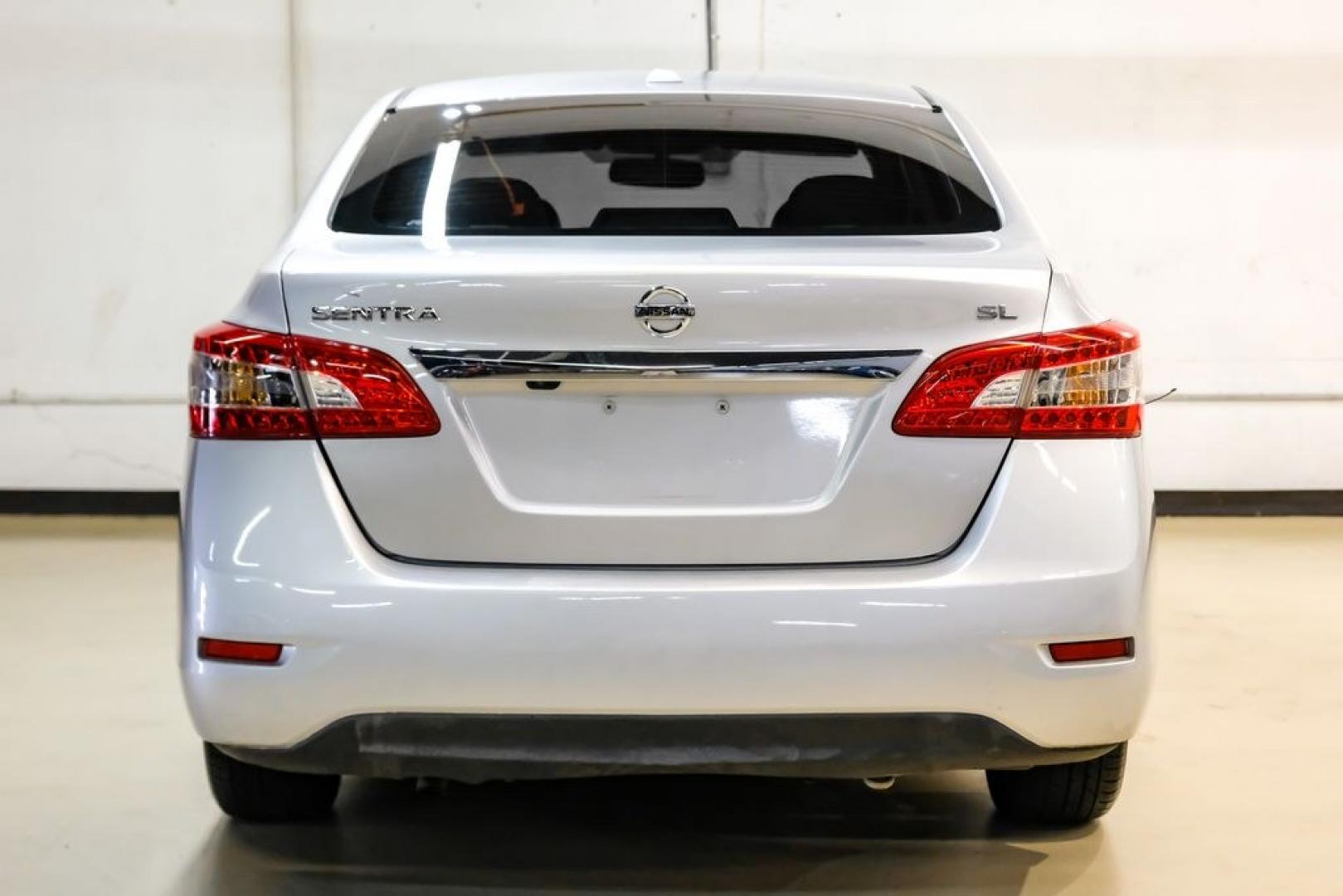 2015 Brilliant Silver /Charcoal Nissan Sentra SL (3N1AB7AP2FY) with an 1.8L 4-Cylinder DOHC 16V engine, CVT transmission, located at 15300 Midway Rd., Addison, TX, 75001, (972) 702-0011, 32.958321, -96.838074- Photo#8