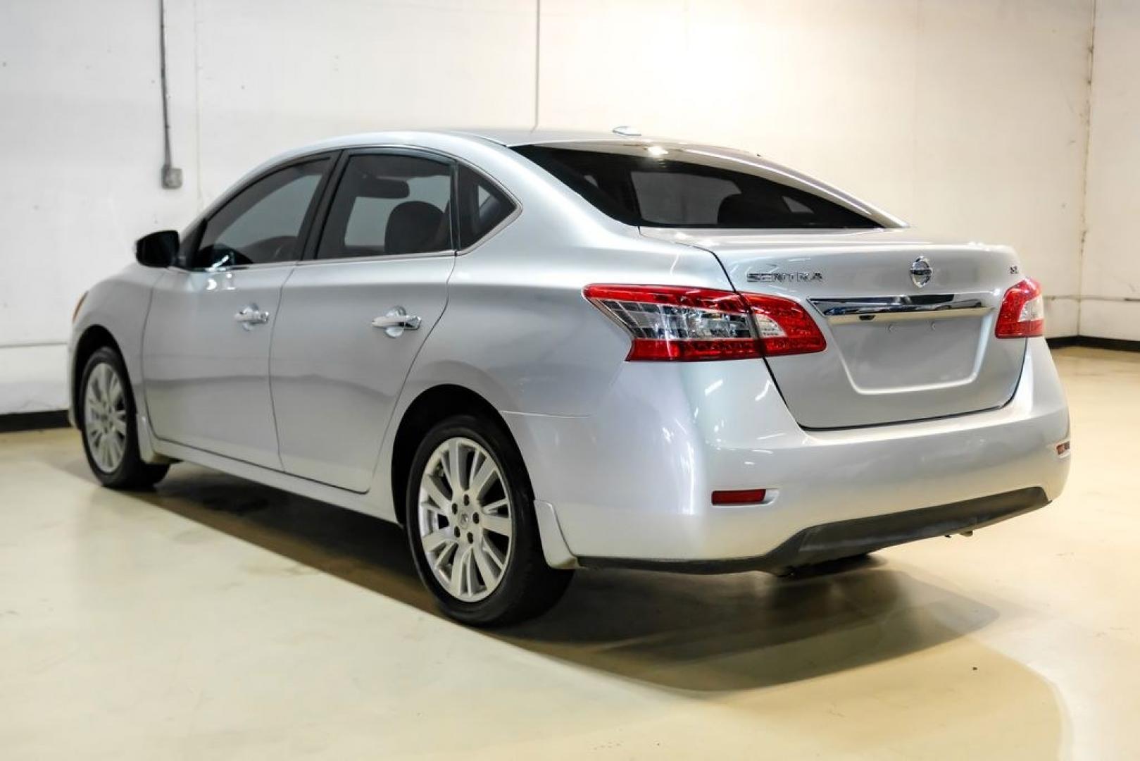 2015 Brilliant Silver /Charcoal Nissan Sentra SL (3N1AB7AP2FY) with an 1.8L 4-Cylinder DOHC 16V engine, CVT transmission, located at 15300 Midway Rd., Addison, TX, 75001, (972) 702-0011, 32.958321, -96.838074- Photo#9