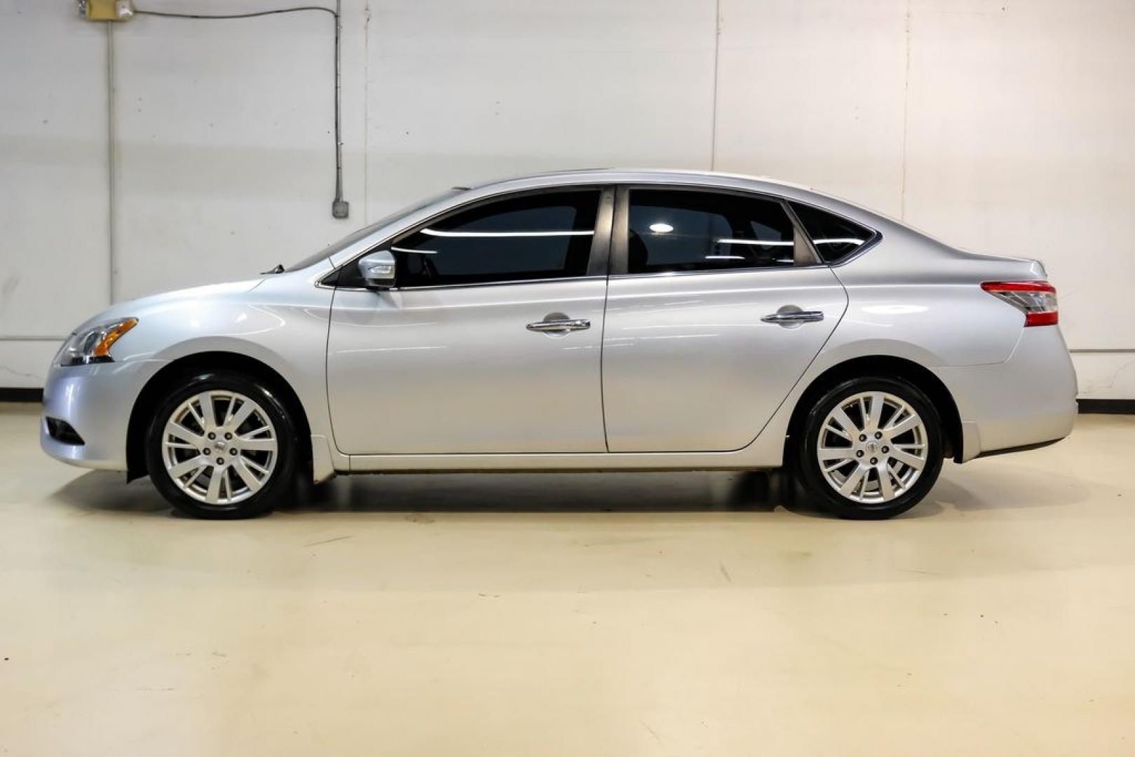2015 Brilliant Silver /Charcoal Nissan Sentra SL (3N1AB7AP2FY) with an 1.8L 4-Cylinder DOHC 16V engine, CVT transmission, located at 15300 Midway Rd., Addison, TX, 75001, (972) 702-0011, 32.958321, -96.838074- Photo#10