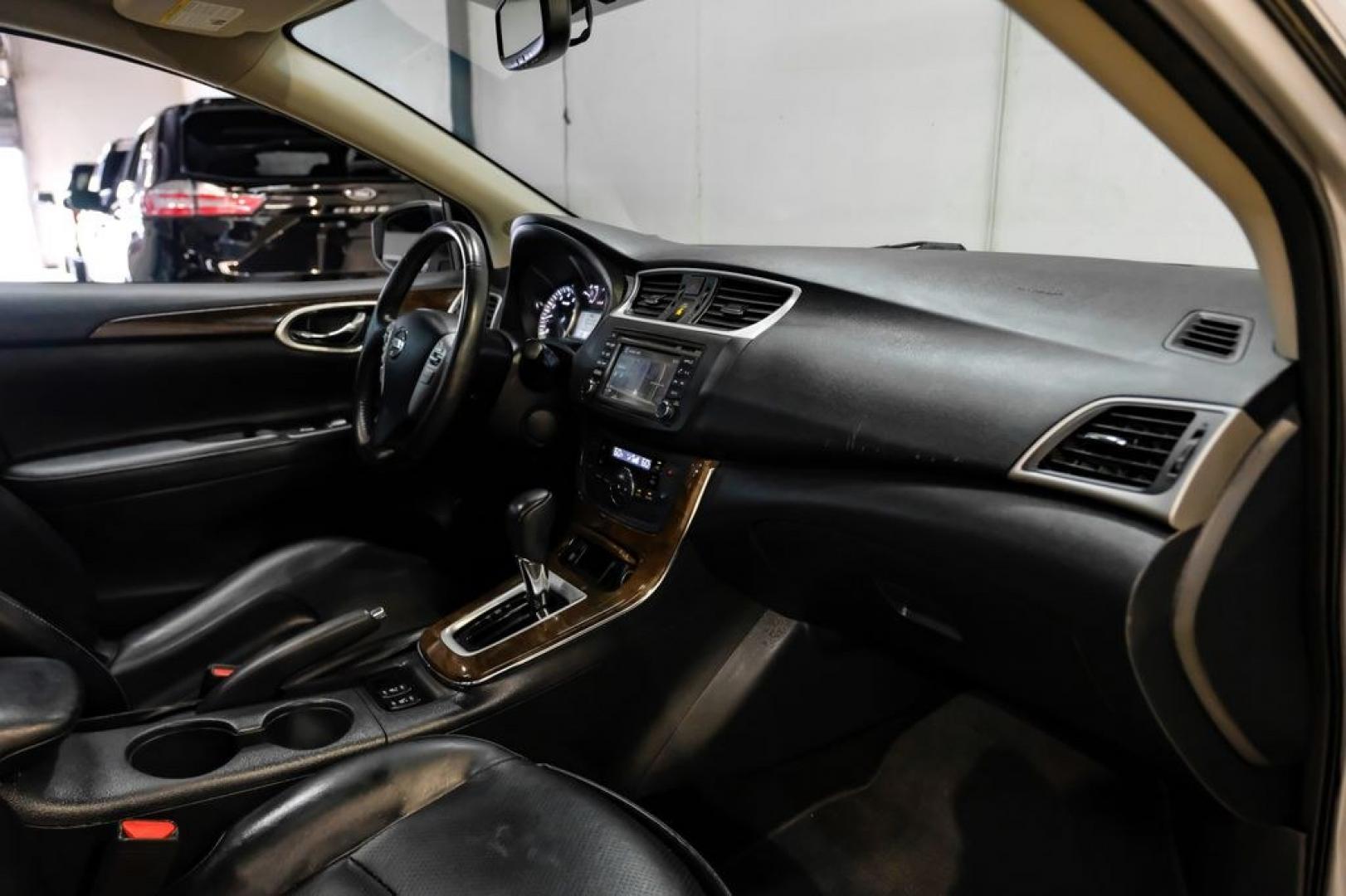 2015 Brilliant Silver /Charcoal Nissan Sentra SL (3N1AB7AP2FY) with an 1.8L 4-Cylinder DOHC 16V engine, CVT transmission, located at 15300 Midway Rd., Addison, TX, 75001, (972) 702-0011, 32.958321, -96.838074- Photo#11