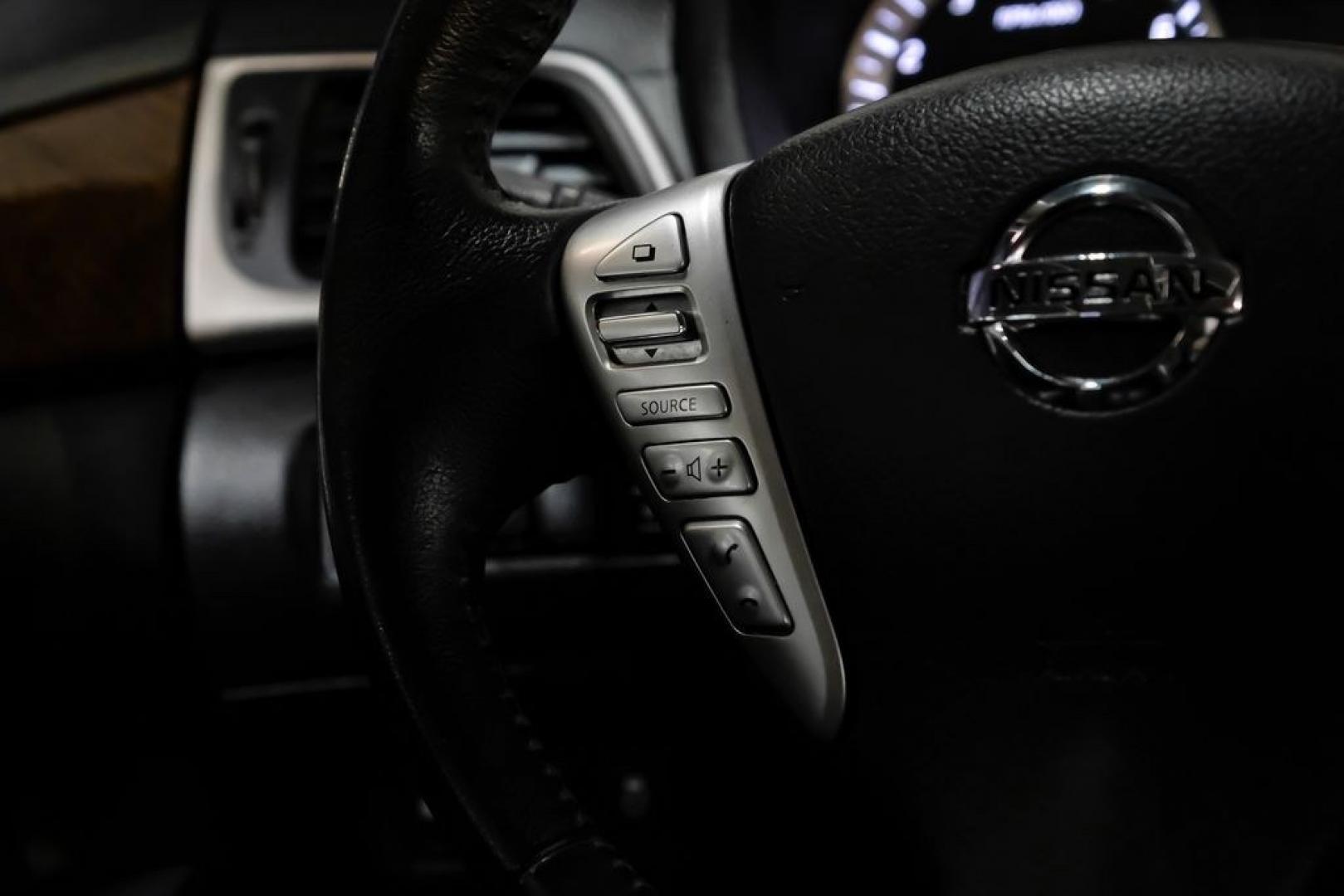 2015 Brilliant Silver /Charcoal Nissan Sentra SL (3N1AB7AP2FY) with an 1.8L 4-Cylinder DOHC 16V engine, CVT transmission, located at 15300 Midway Rd., Addison, TX, 75001, (972) 702-0011, 32.958321, -96.838074- Photo#14