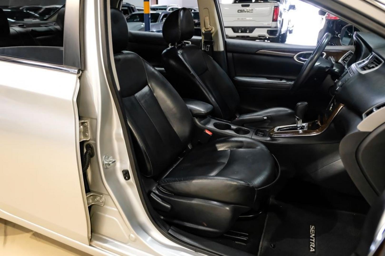2015 Brilliant Silver /Charcoal Nissan Sentra SL (3N1AB7AP2FY) with an 1.8L 4-Cylinder DOHC 16V engine, CVT transmission, located at 15300 Midway Rd., Addison, TX, 75001, (972) 702-0011, 32.958321, -96.838074- Photo#26
