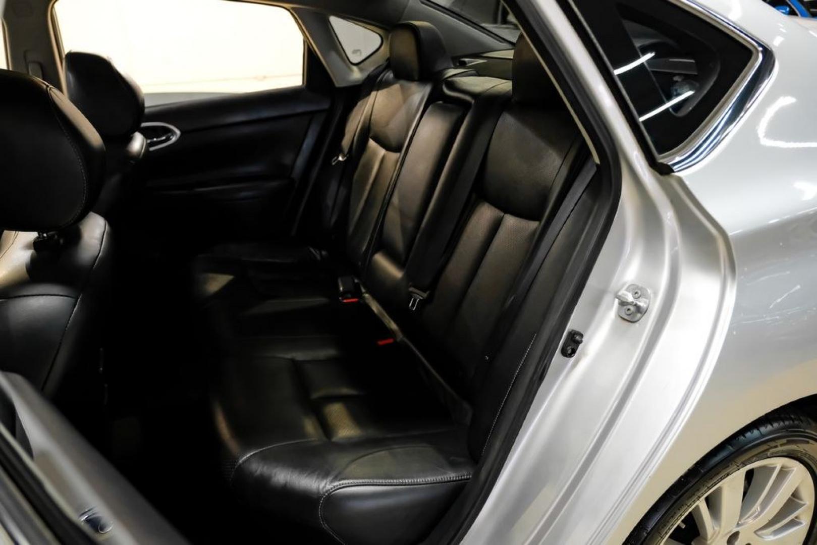 2015 Brilliant Silver /Charcoal Nissan Sentra SL (3N1AB7AP2FY) with an 1.8L 4-Cylinder DOHC 16V engine, CVT transmission, located at 15300 Midway Rd., Addison, TX, 75001, (972) 702-0011, 32.958321, -96.838074- Photo#30