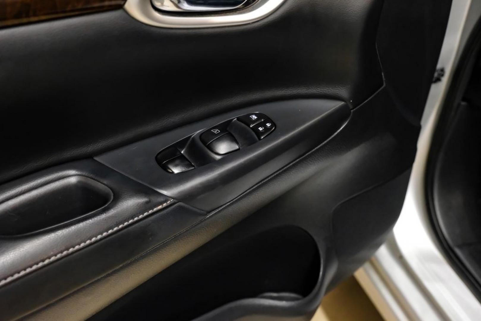 2015 Brilliant Silver /Charcoal Nissan Sentra SL (3N1AB7AP2FY) with an 1.8L 4-Cylinder DOHC 16V engine, CVT transmission, located at 15300 Midway Rd., Addison, TX, 75001, (972) 702-0011, 32.958321, -96.838074- Photo#34