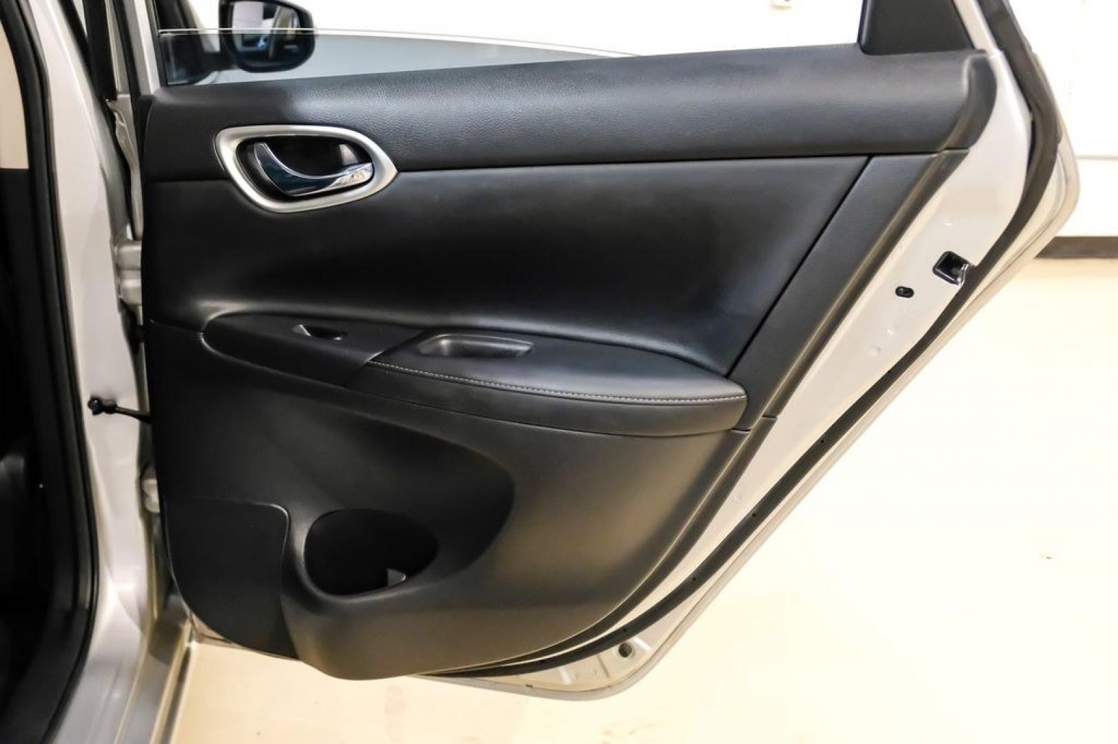 2015 Brilliant Silver /Charcoal Nissan Sentra SL (3N1AB7AP2FY) with an 1.8L 4-Cylinder DOHC 16V engine, CVT transmission, located at 15300 Midway Rd., Addison, TX, 75001, (972) 702-0011, 32.958321, -96.838074- Photo#37