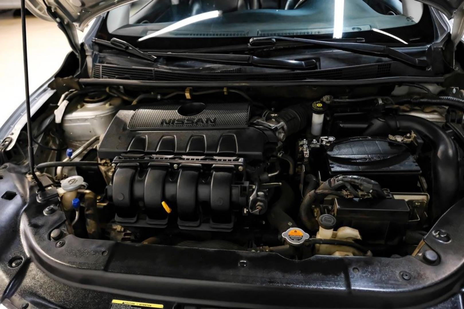 2015 Brilliant Silver /Charcoal Nissan Sentra SL (3N1AB7AP2FY) with an 1.8L 4-Cylinder DOHC 16V engine, CVT transmission, located at 15300 Midway Rd., Addison, TX, 75001, (972) 702-0011, 32.958321, -96.838074- Photo#41