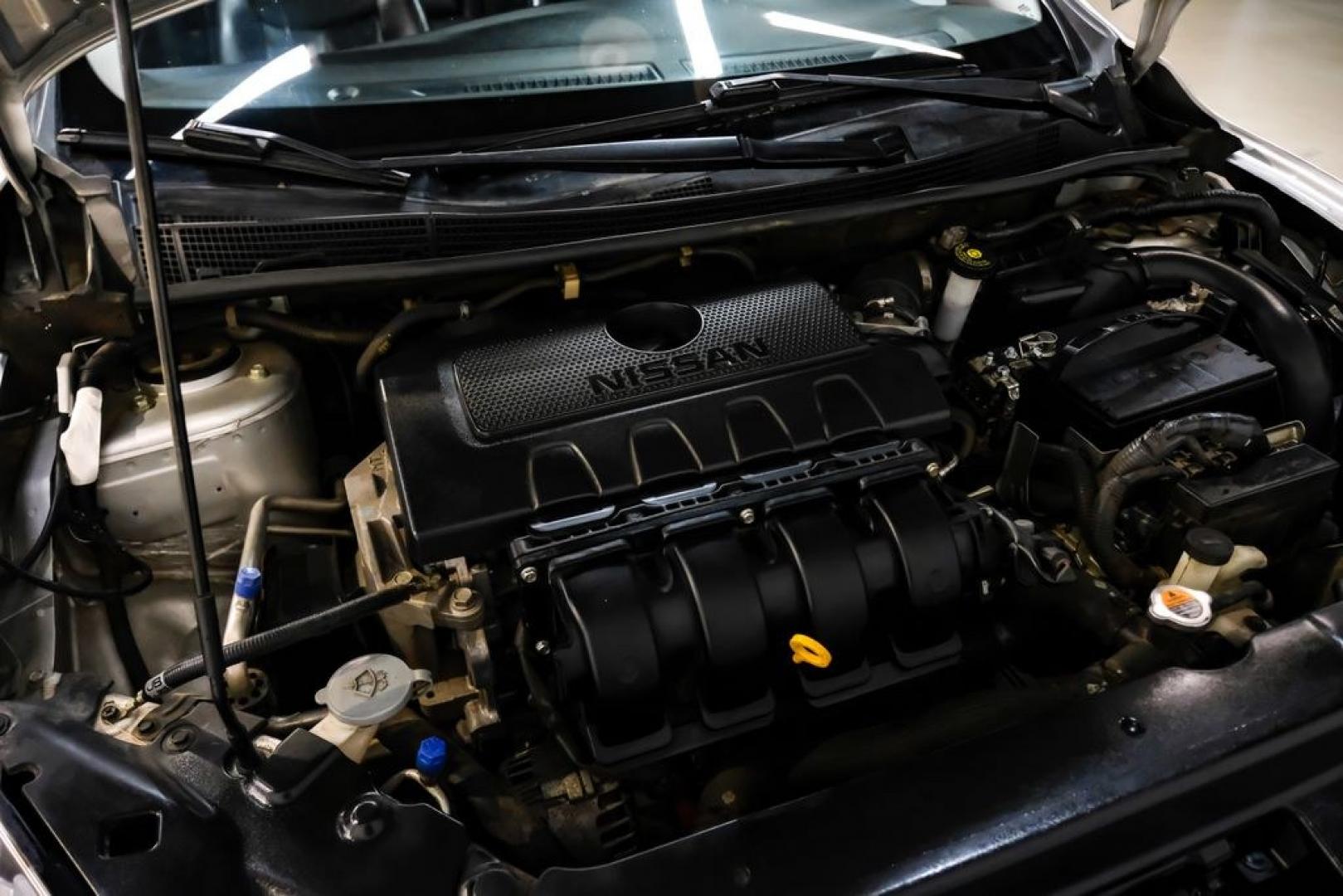 2015 Brilliant Silver /Charcoal Nissan Sentra SL (3N1AB7AP2FY) with an 1.8L 4-Cylinder DOHC 16V engine, CVT transmission, located at 15300 Midway Rd., Addison, TX, 75001, (972) 702-0011, 32.958321, -96.838074- Photo#42